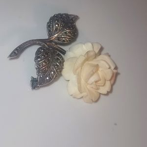 Vintage sterling and ivory rose pin.